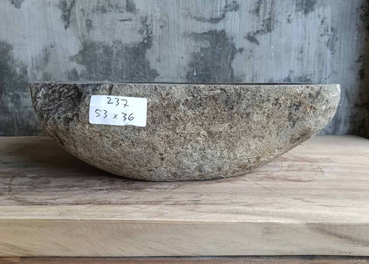 Front angle of handcrafted sink 6237-5336 showing earthy raw texture and asymmetrical lines
