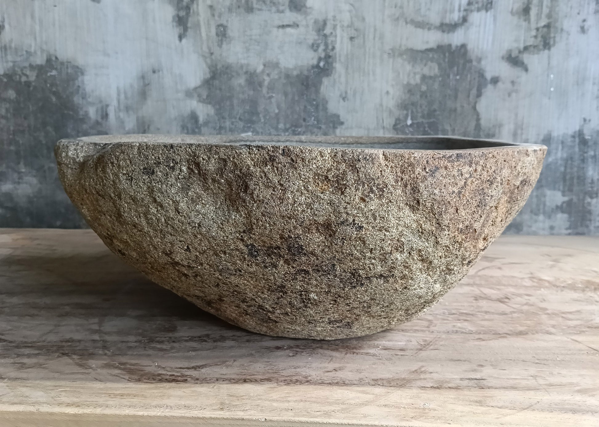 Right view of rare-patterned stone sink highlighting unique coloration and texture

