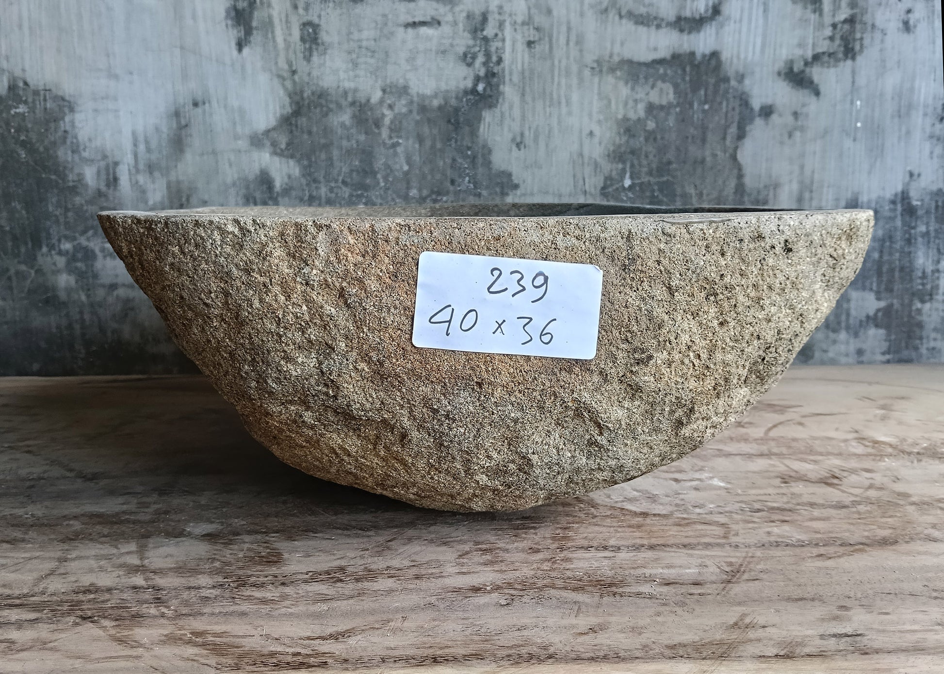 Back side of 16x14 sink with natural stone texture in gray-brown tones
