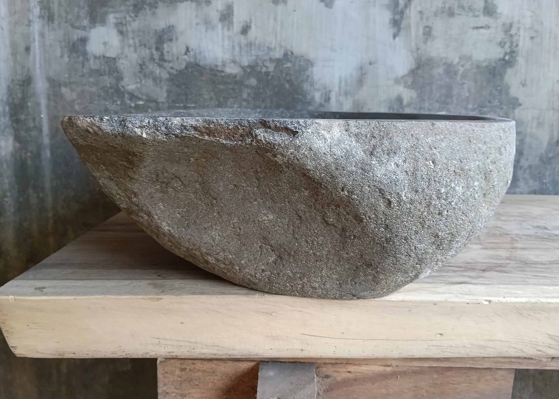 Left side of sink 6245-5640 highlighting rugged stone texture and matte interior finish

