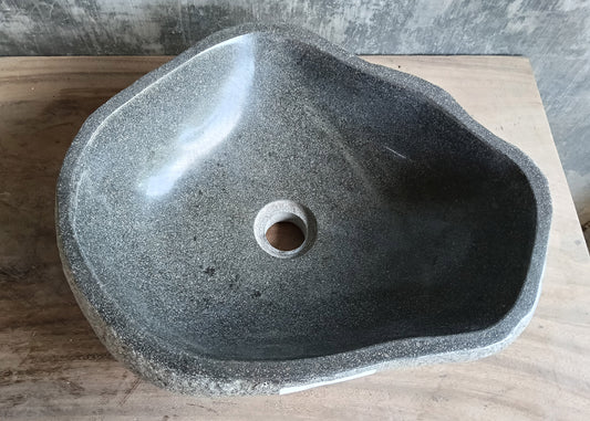 Top view of handcrafted 17x14 inch gray river stone sink with irregular shape
