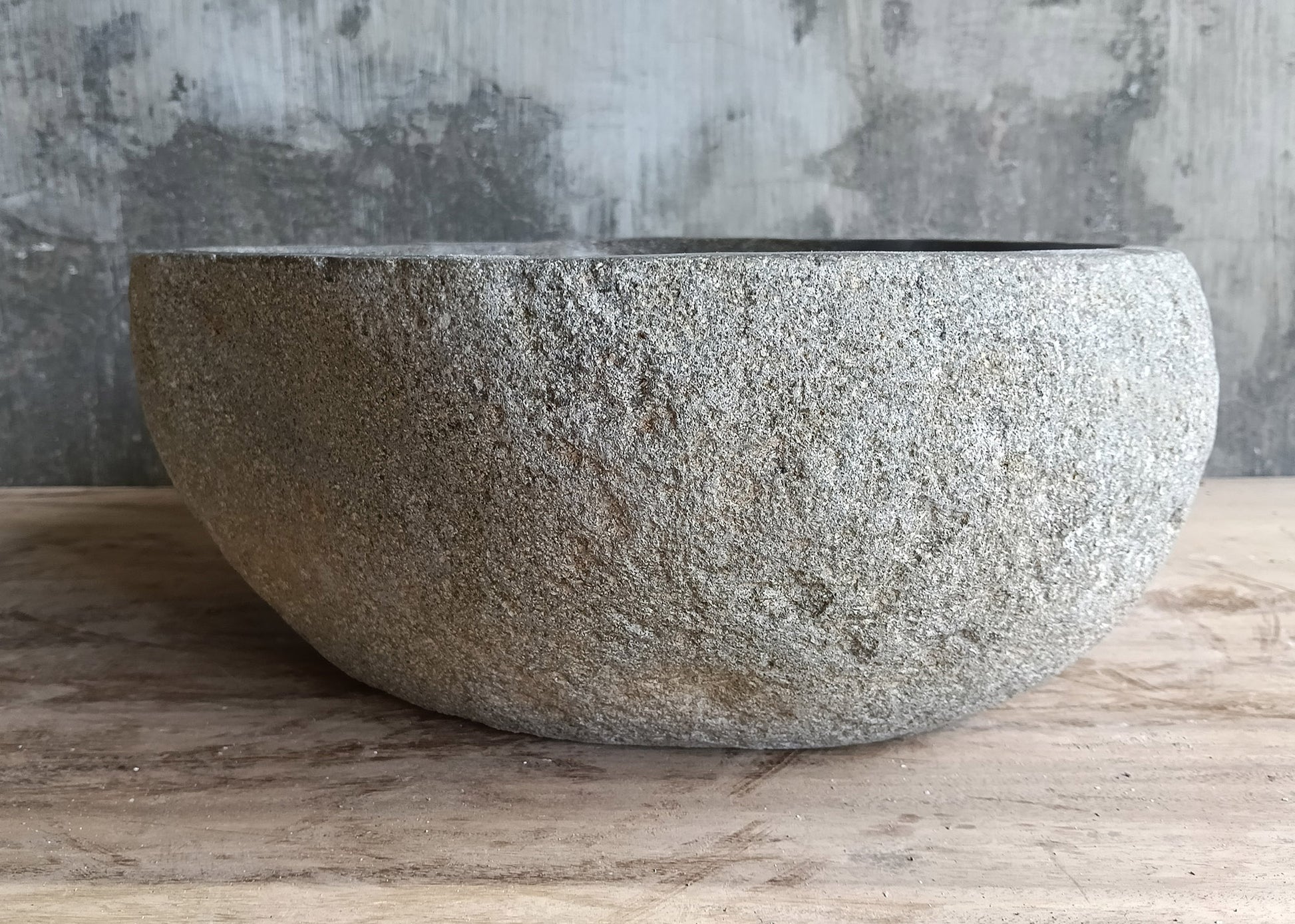 Side angle of natural stone sink 44x36 cm with unique contour
