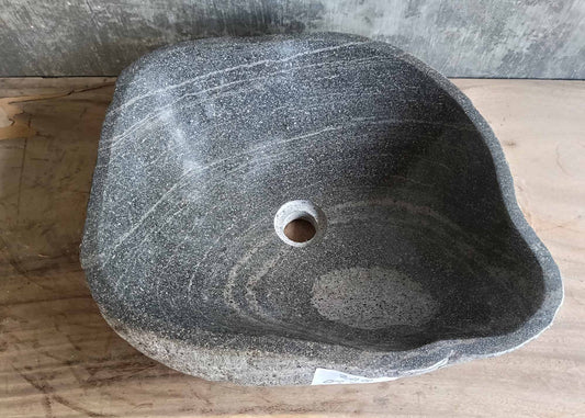 Top view of gray river stone sink with striped interior and 17x16 inch size
