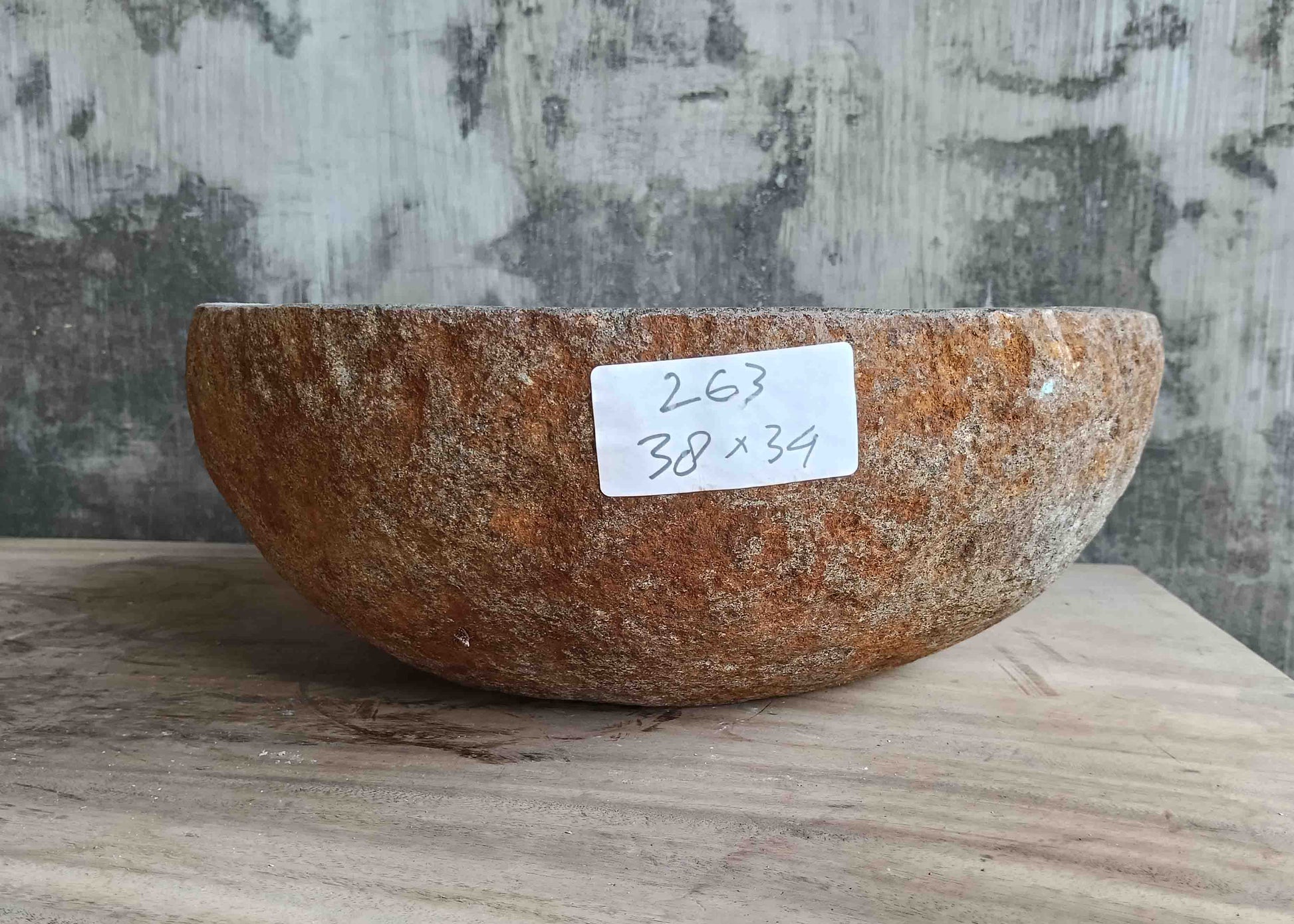 Right side view of 15×13 inch grey river stone sink showing boat-like profile
