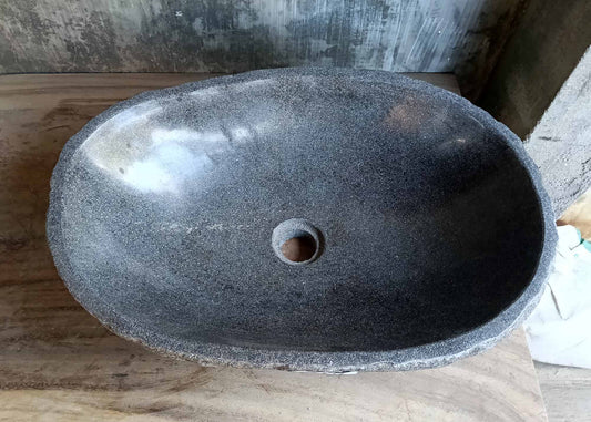 Top view of river stone sink 6269-5337 with charcoal gray polished interior and wide oval bowl
