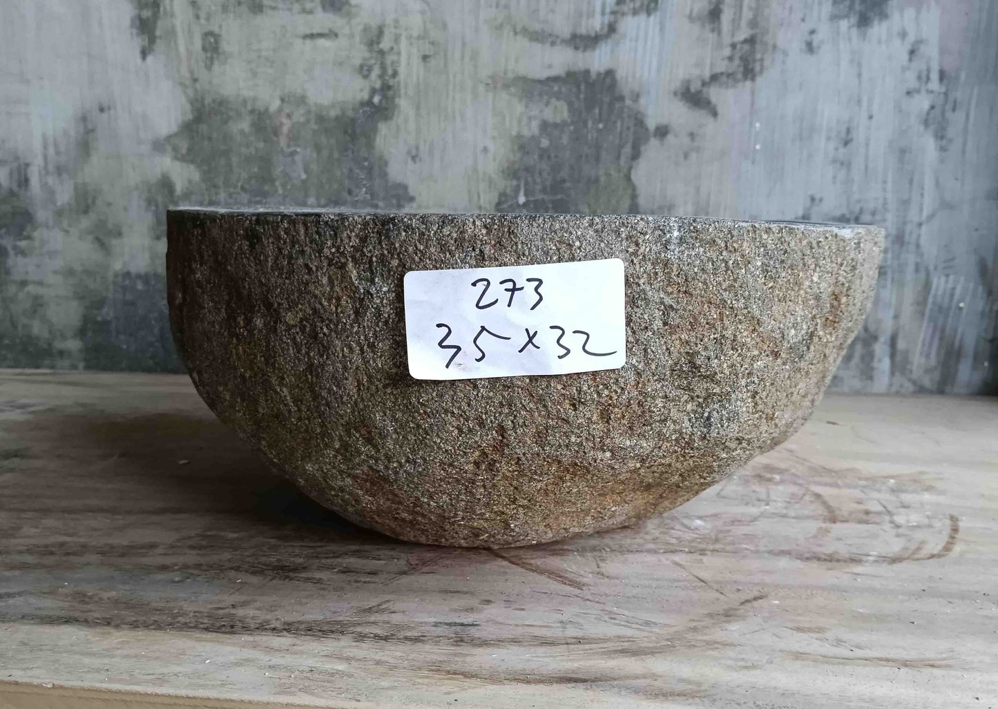 Left side view of 14×13 inch grey river stone sink showing boat-like profile

