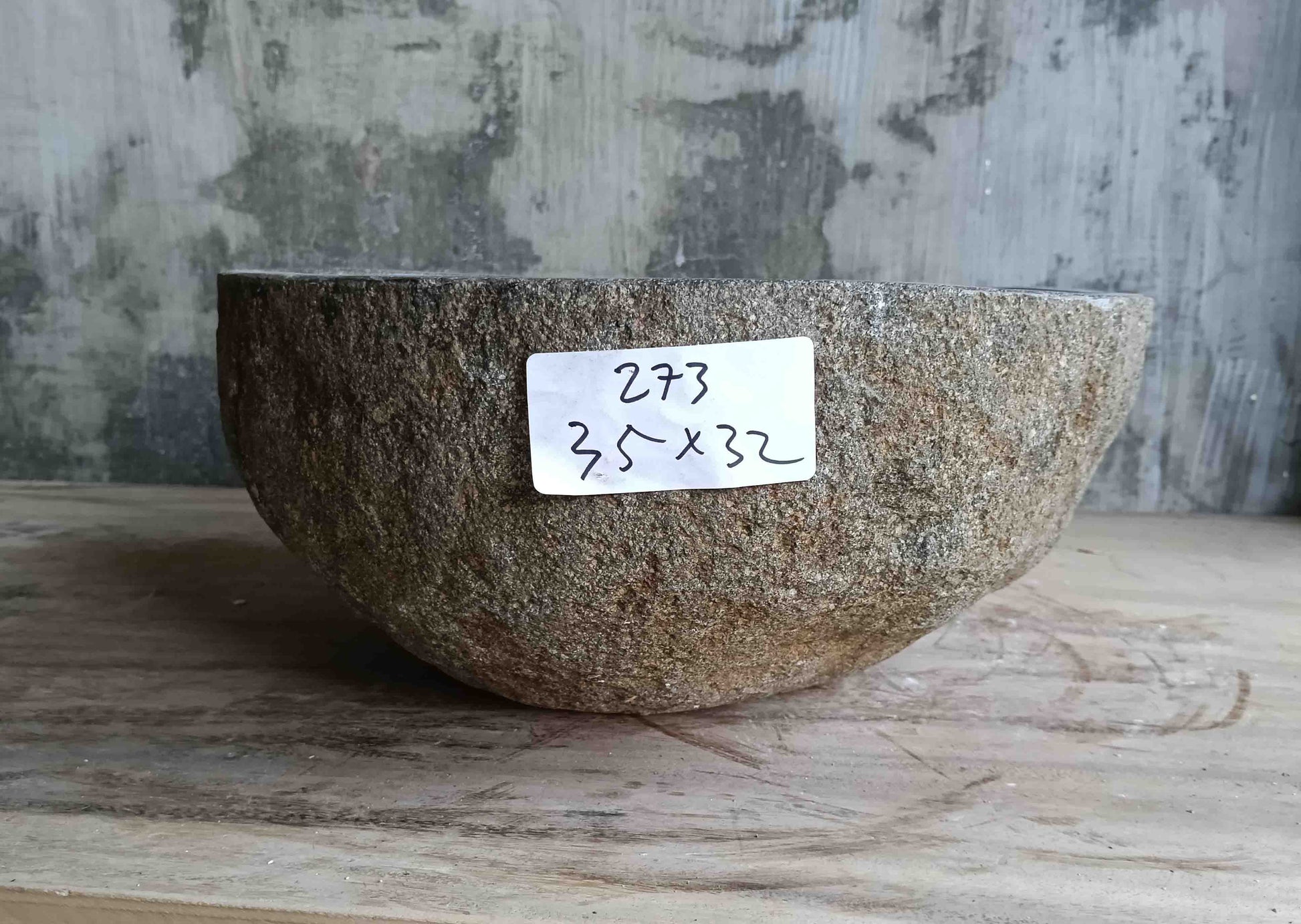 Left side view of 14×13 inch grey river stone sink showing boat-like profile
