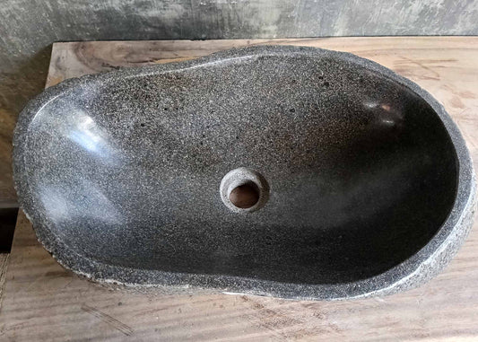 Top view of river stone sink 6275-5230 with dark polished oval bowl and natural texture
