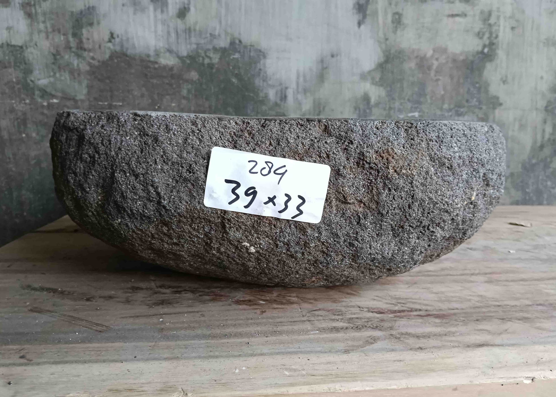 Right side view of 15×13 inch grey river stone sink showing boat-like profile
