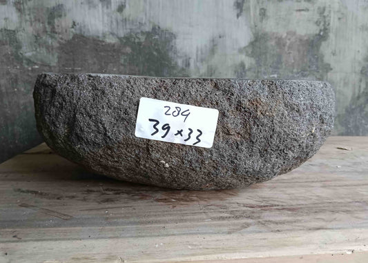 Right side view of 15×13 inch grey river stone sink showing boat-like profile
