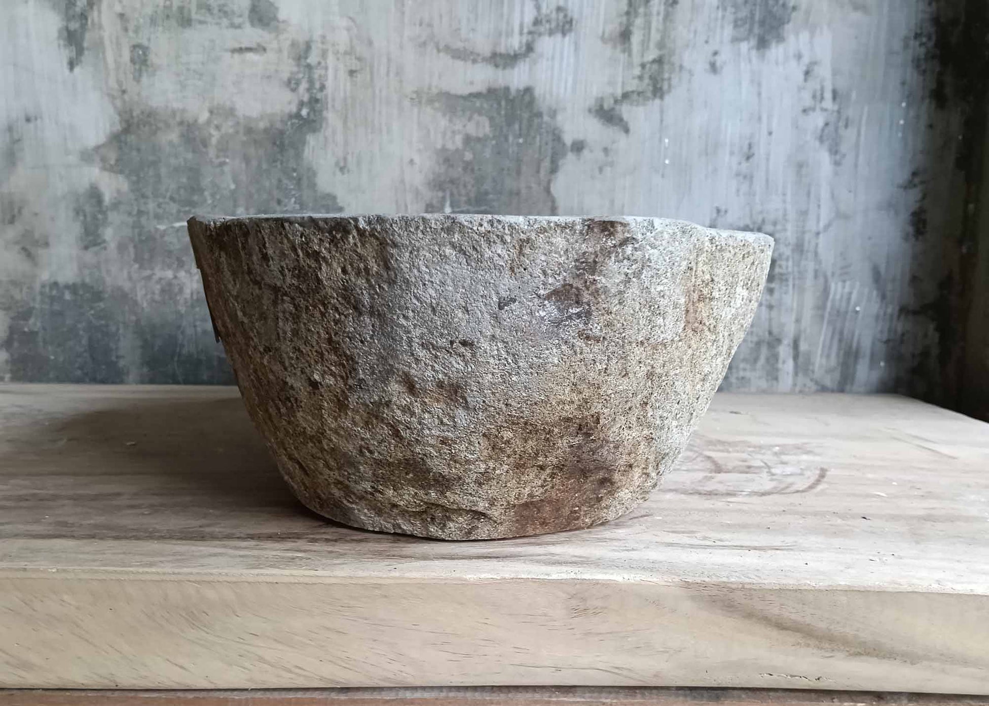 Right profile of handcrafted oval basin with earthy tones

