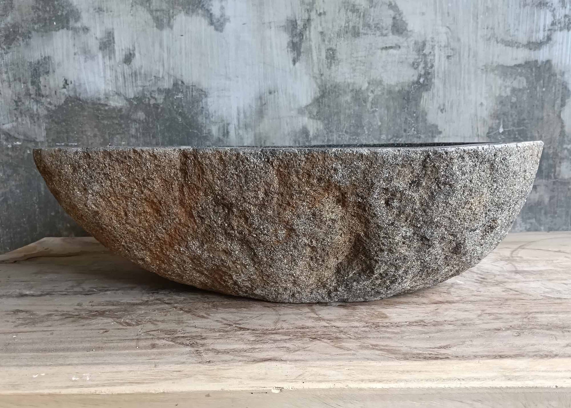 Left side of river stone sink 6297-5338 with triangular contour and thick outer wall
