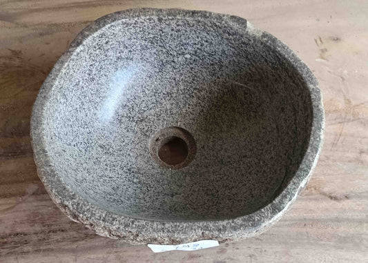 Top view of handcrafted light-gray 13×12 inch river stone sink in smooth oval form
