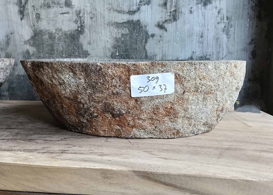 Front side of handcrafted sink 6309-5037 showing raw beige-brown stone texture
