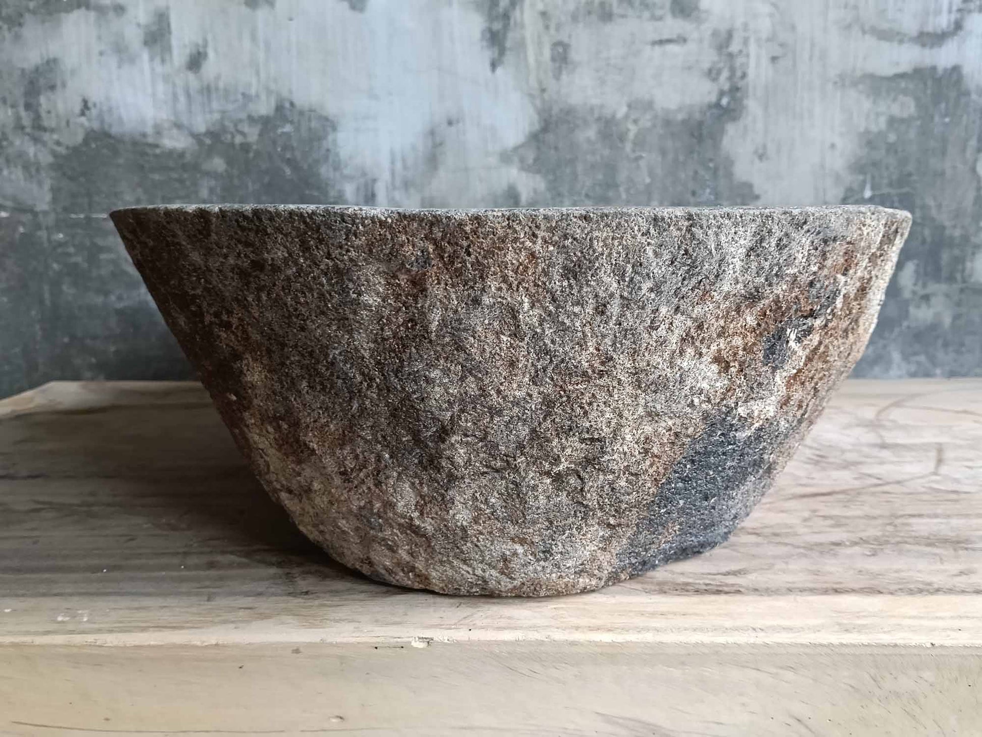 Left side of river stone sink 6309-5037 showing soft rim and warm-toned raw finish
