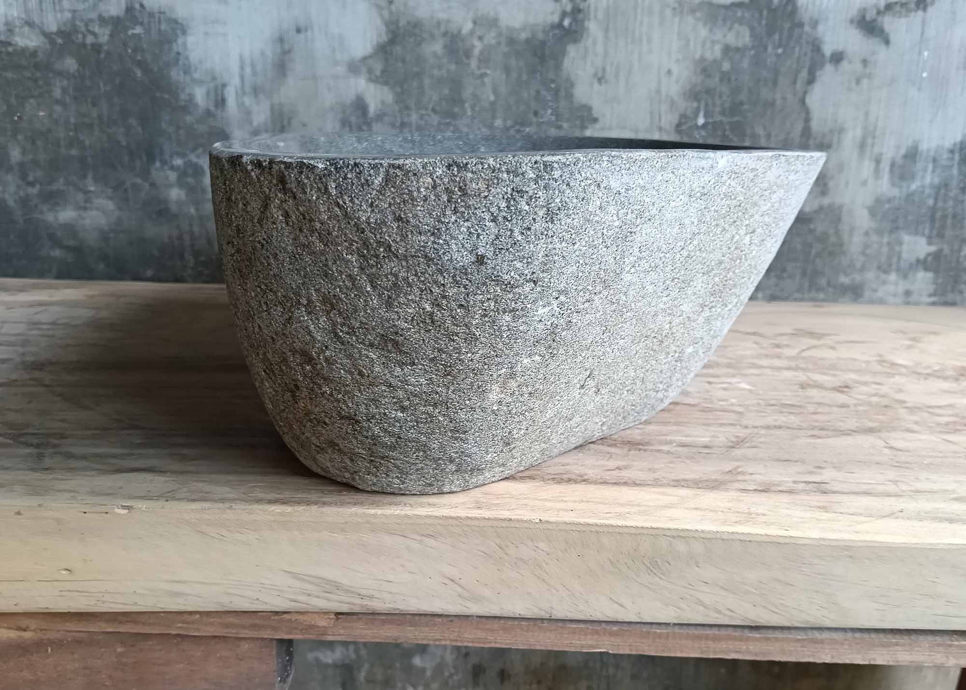 Left view of river stone sink 6315-5132 showing gentle slope and earthy tone shell

