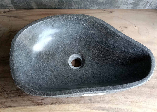 Top view of river stone sink 6315-5132 with triangular shape and polished dark gray interior
