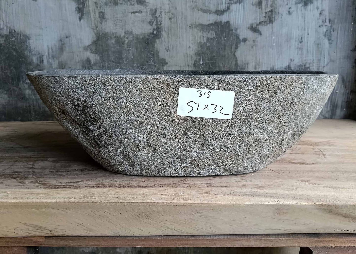 Front side of handcrafted sink 6315-5132 showing smooth contours and raw stone texture
