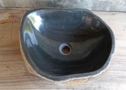 Top view of handcrafted dark black 14×17 inch river stone sink
