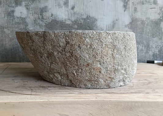 Right side view of 16×13 inch gray river stone sink in oval trapezoid shape
