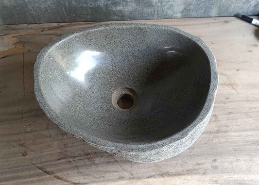 Top view of handcrafted gray 16×13 inch river stone sink
