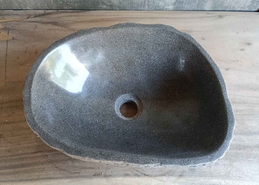 Top view of handcrafted gray 16×13 inch river stone sink
