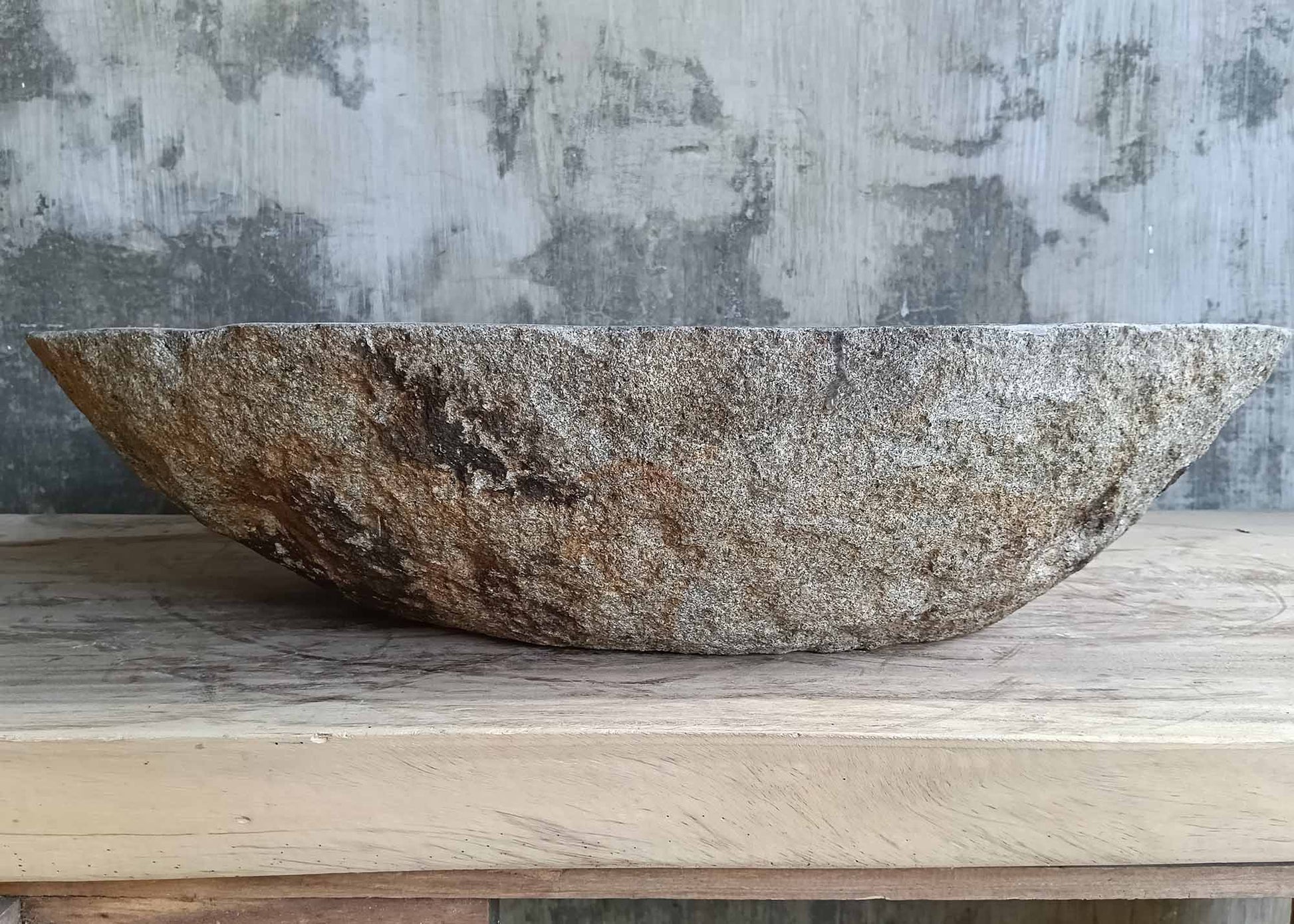 Back side of river stone sink 6241-6342 with rugged natural stone tones in brown and gray

