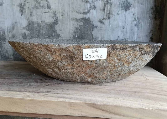 Front profile of stone sink 6241-6342 showing elongated oval form and raw textured surface
