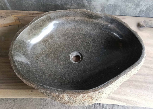 Top view of river stone sink 6347-5845 with wide oval shape and dark polished interior
