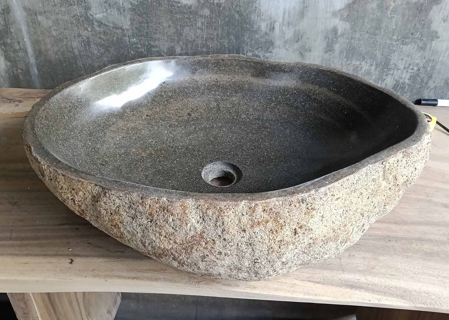 Back side of sink 6347-5845 showing raw stone exterior with sandy and red-toned patina
