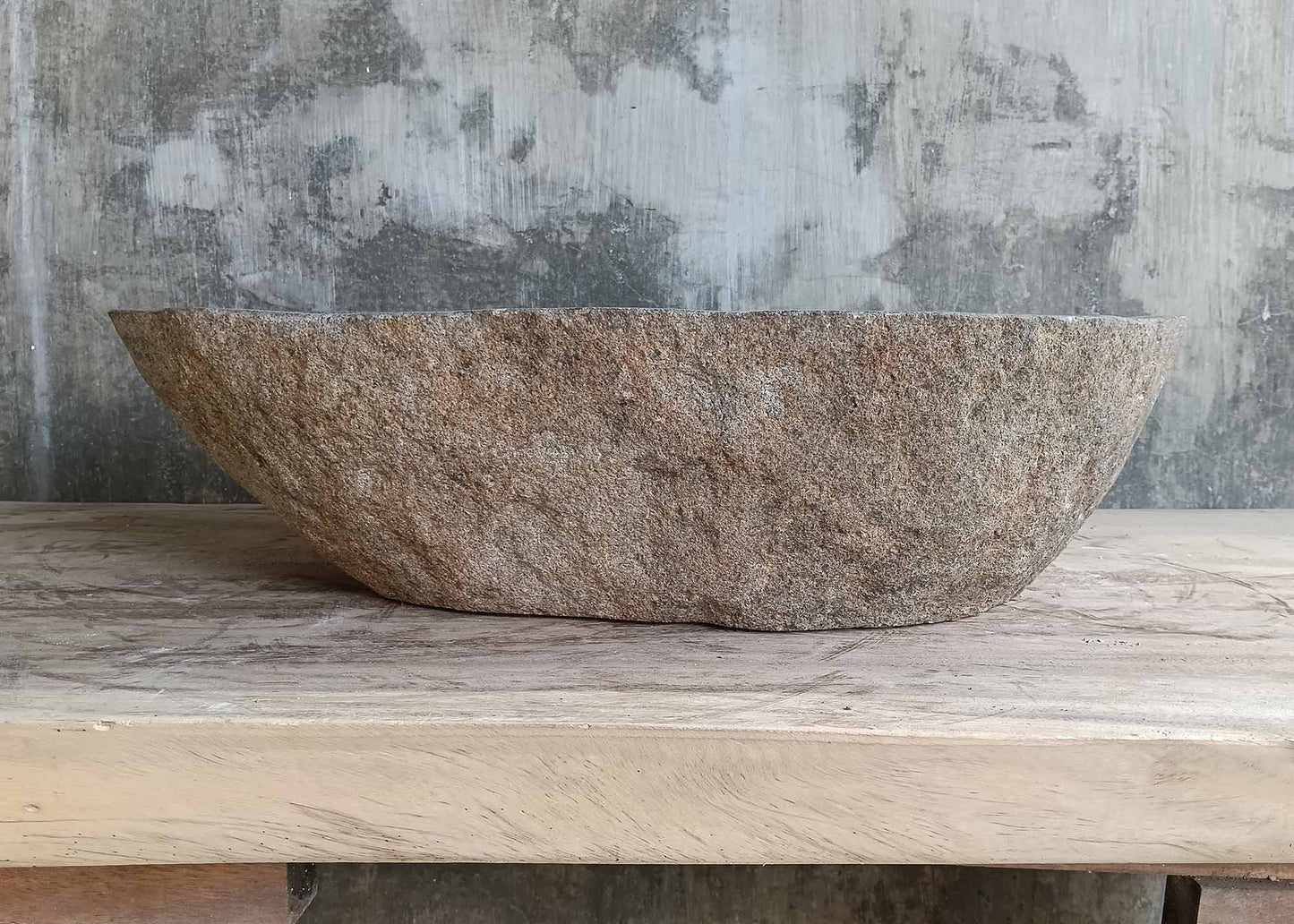 Back view of stone sink 6373-6136 showing rough beige stone shell and long silhouette
