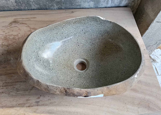 Oval rustic river stone sink – top view
