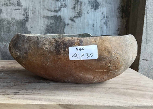 Earthy textured river stone sink – front view
