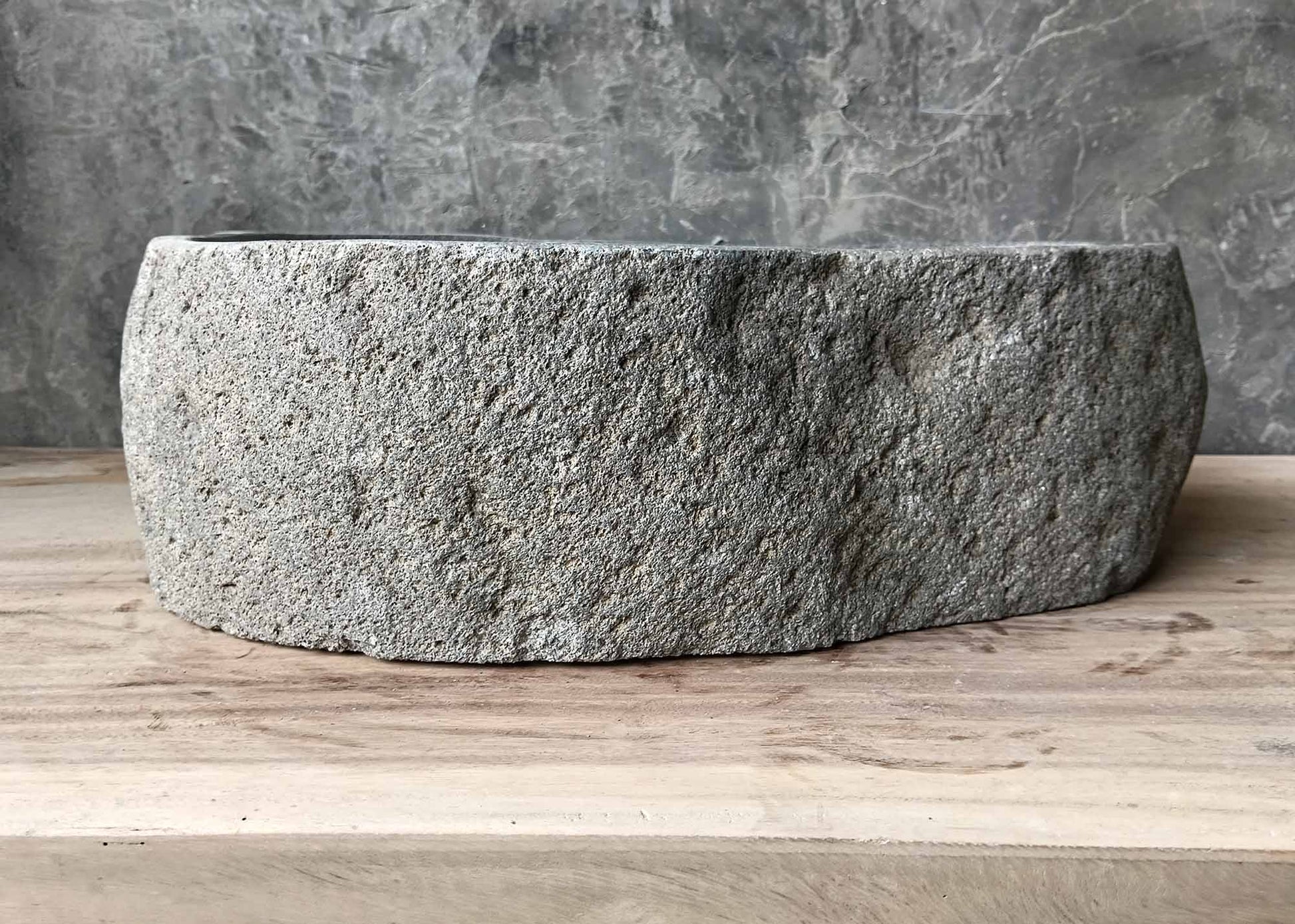 Flat sculpted edge river stone sink – front view
