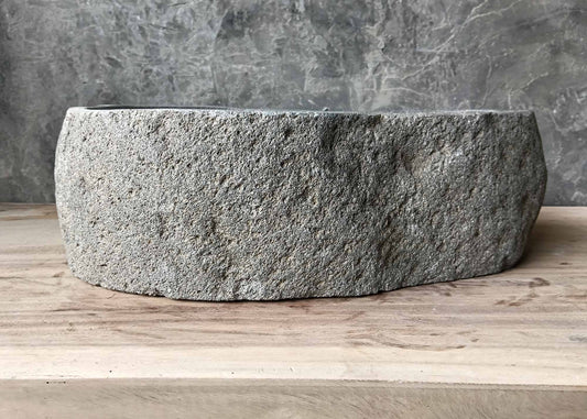 Flat sculpted edge river stone sink – front view
