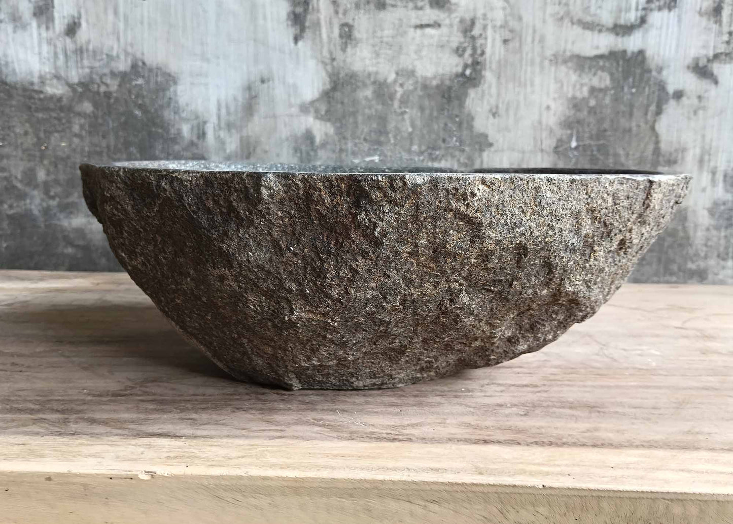 Hand-sculpted rustic stone basin – back view
