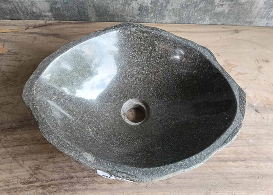 Polished dark gray river stone sink – top view
