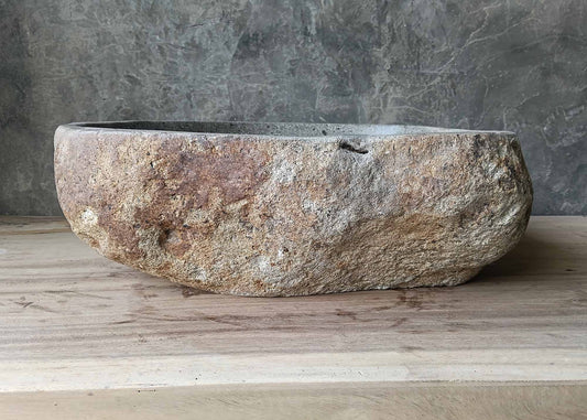 Rusty brown handcrafted stone sink – front view
