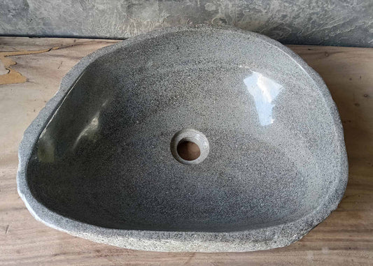 Polished light gray river stone sink – top view
