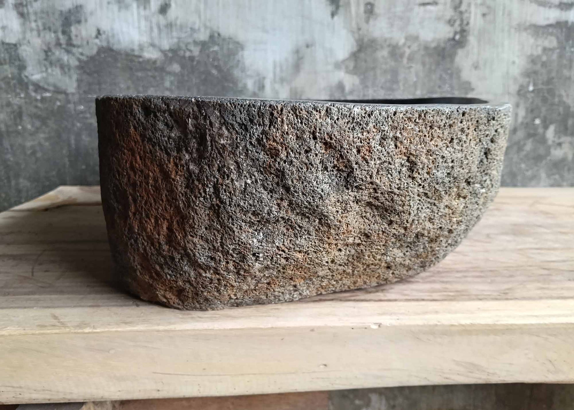 Left-side angle showing rugged edge and earthy coloration of the handcrafted basin

