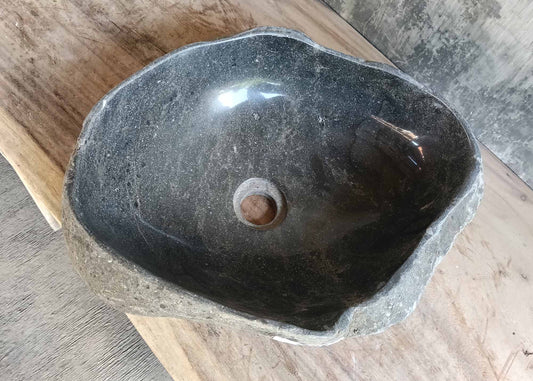 Top view of handcrafted river stone sink 6445-4236 with dark gray polished interior

