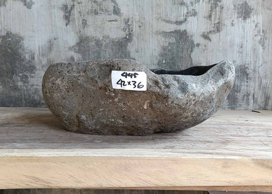 Front view of sink 6445-4236 showing rugged stone exterior and organic shape
