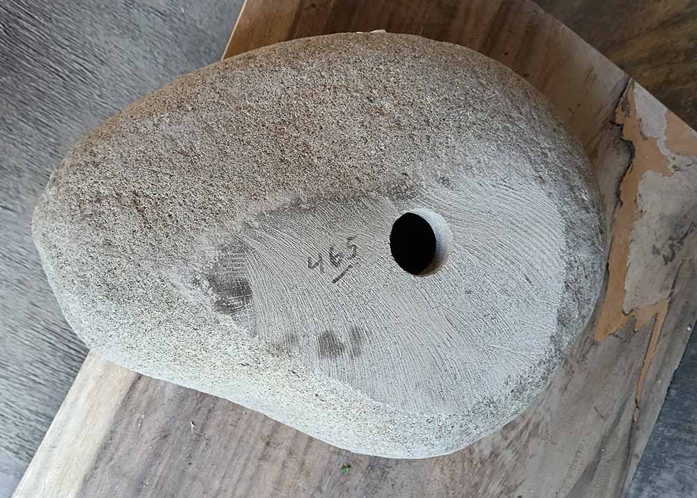 Bottom of sink 6465-4433 showing drain hole and unpolished base
