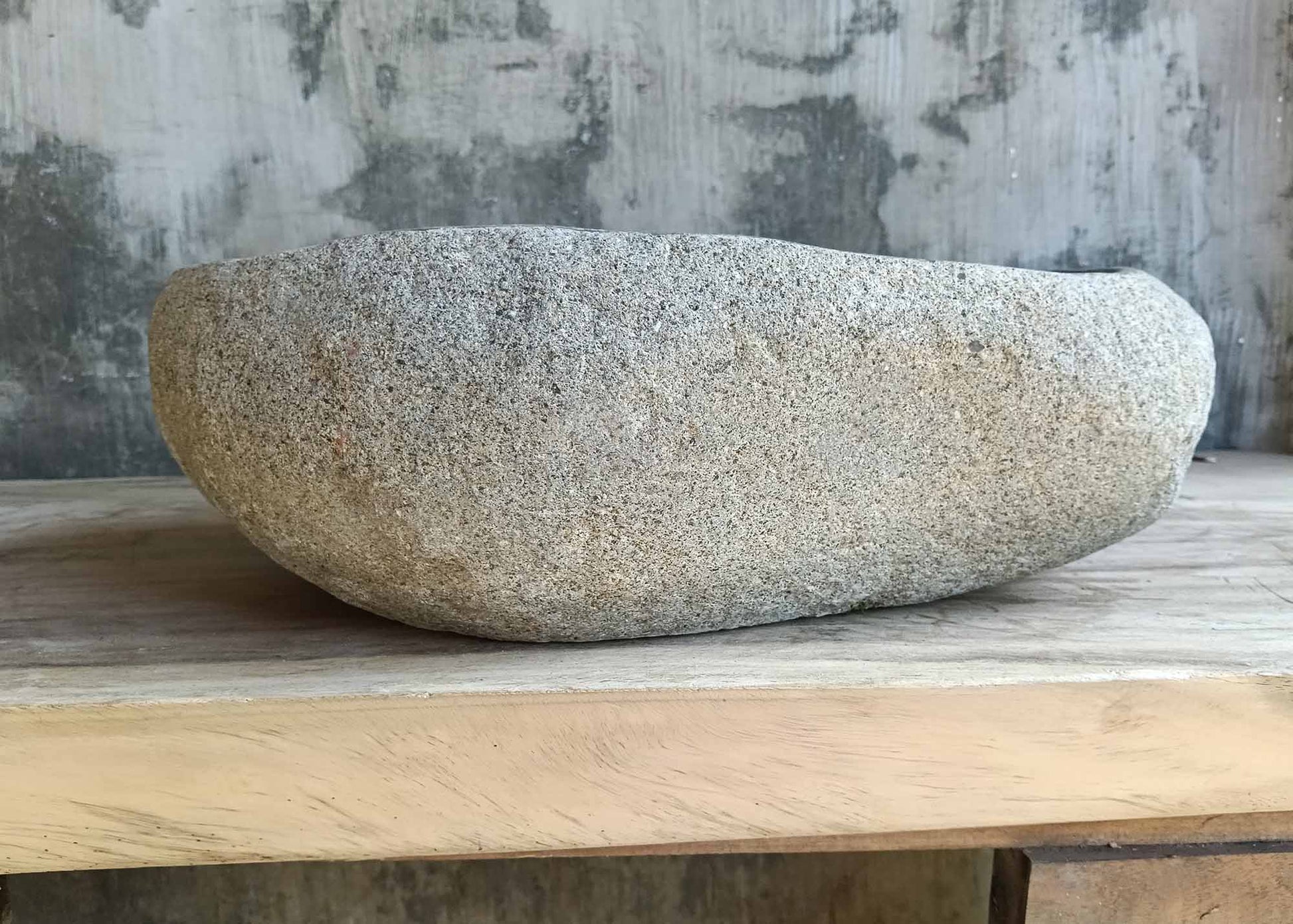 Backside of oval stone sink 6465-4433 showing natural stone finish
