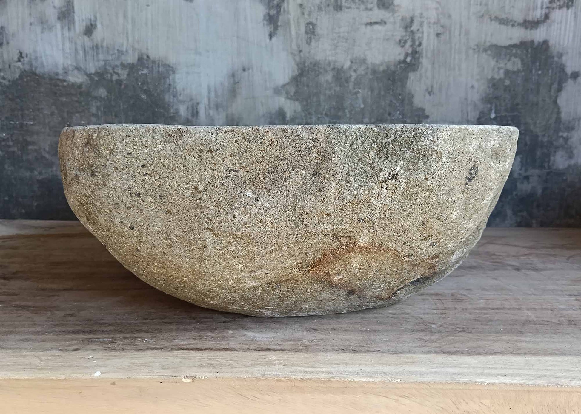 Backside of oval sink 6486-4538 with rough natural gray stone texture
