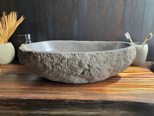 Top view of river stone vessel sink RSS-001 showing the natural interior vein