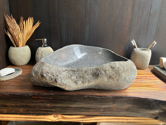 Natural gray organic river stone vessel sink RSS-003 in a bathroom vanity setting