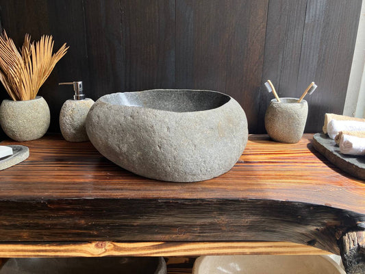Compact natural gray river stone vessel sink RSS-005 in a bathroom vanity setting