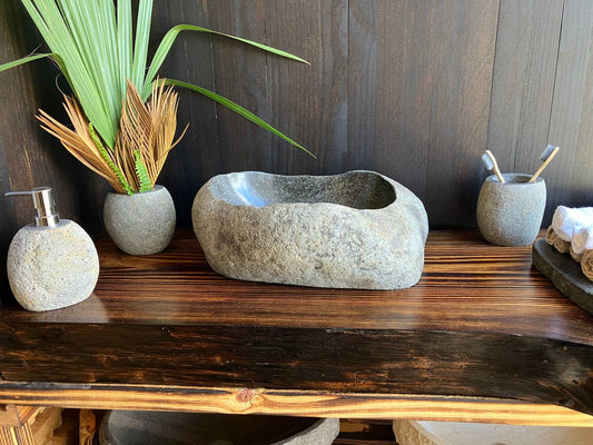 Premium two-tone river stone vessel sink RSS-014 in a bathroom vanity setting