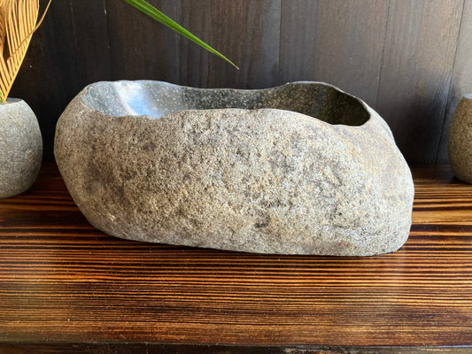 Front angled view of light-gray natural river stone sink RSS-014